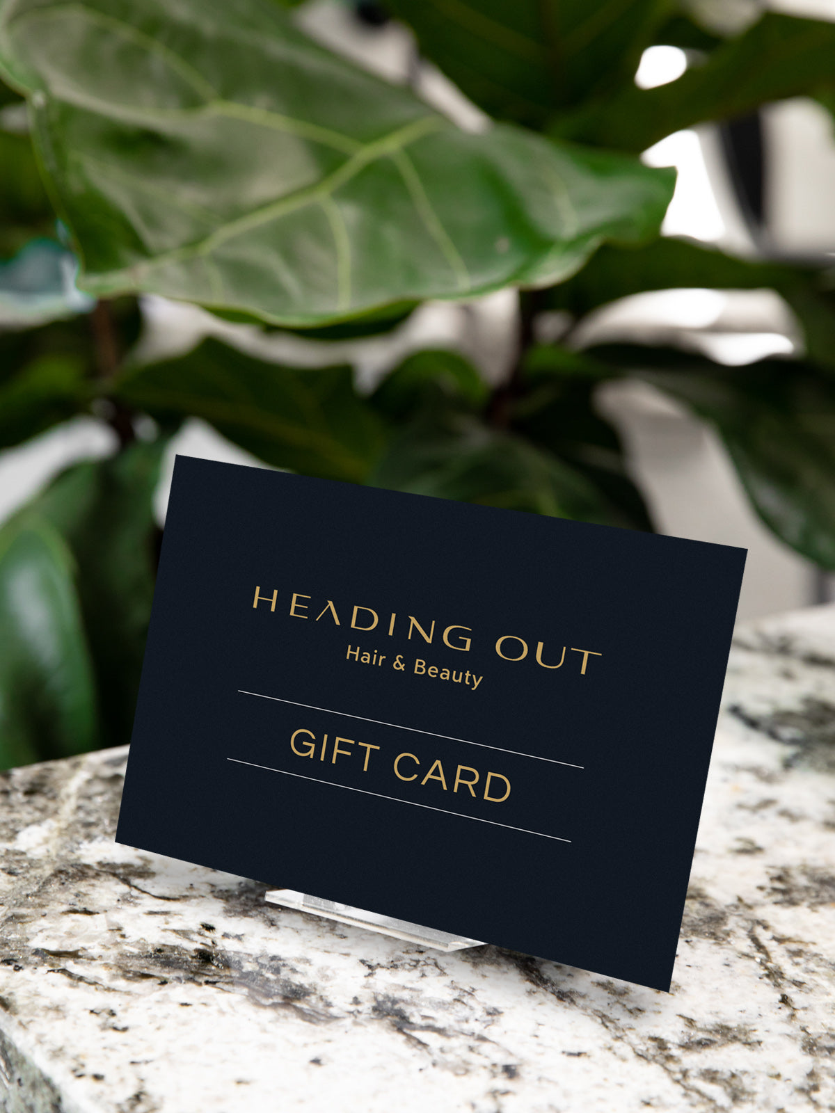 Gift card for Heading Out Hair & Beauty, perfect for pampering and self-empowering salon experiences.